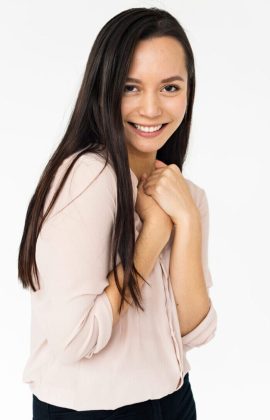 Shy and smiling woman